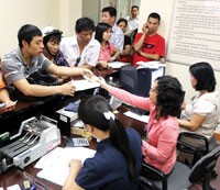 Từ tháng 12/2008, cơ quan thuế sẽ thiết lập đường dây nóng nhằm giải đáp vướng mắc về thuế TNCN.