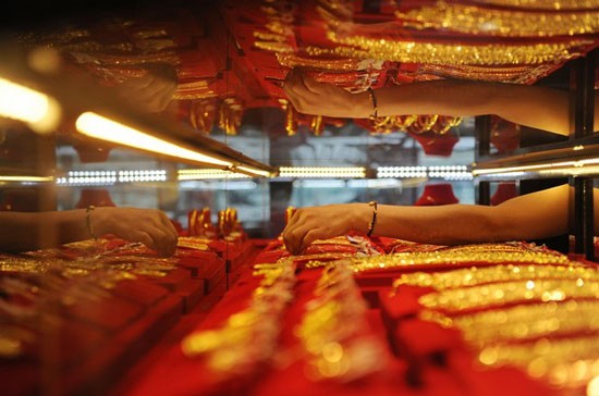 Giá vàng quốc tế đã vượt 1.600 USD/oz, cao nhất mọi thời đại - Ảnh: Getty.