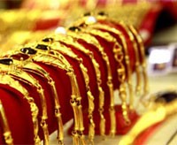 Tháng 7, nhập siêu ở mức thấp nhờ tái xuất vàng