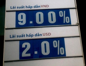 Từ ngày 11/6, trần lãi suất huy động VND là 9%/năm - Ảnh: Vnexpress