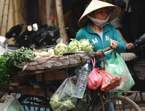 CPI tính theo năm của tháng 11, tuy cao hơn so với 3 tháng trước, nhưng vẫn thấp xa so với đỉnh điểm tháng 8/2011 (23,02%) - Ảnh: Getty
